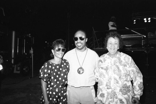 Dorothy Height posing with Melba Moore and Stevie Wonder at the Black Family Reunion, Los Angeles, 1989