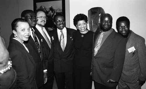 "Spirits in Stone" exhibit participants posing together, Los Angeles, 1995