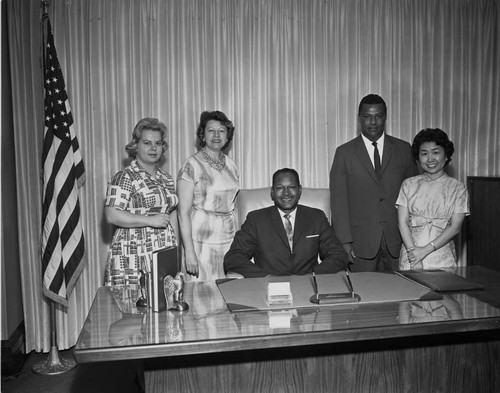 Tom Bradley posing with his staff, Los Angeles, 1963