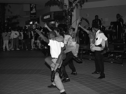 Dancers performing during Winter Carnival at Crenshaw Plaza, Los Angeles, 1989