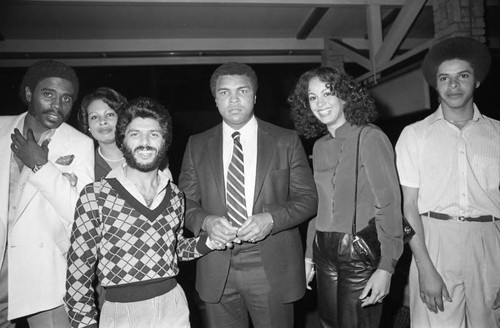 Muhammad Ali posing with others at a Bradley rally, Los Angeles, 1983