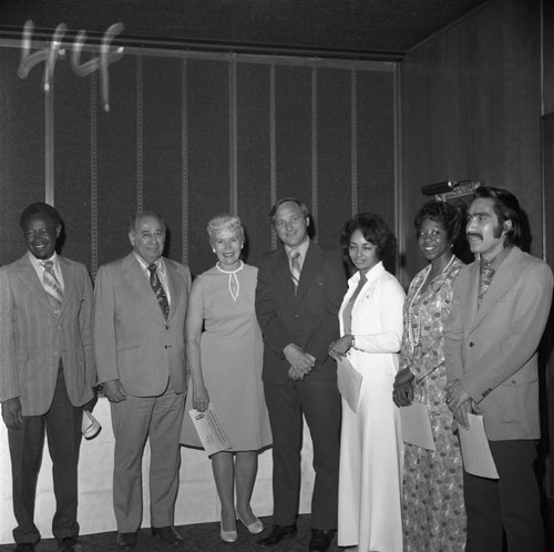 Albert Cherry posing with supporters of the Compton College basketball team, Hawthorne, California, 1973