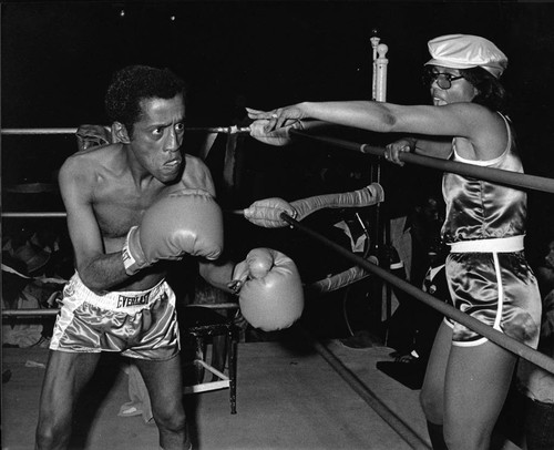 Sammy Davis, Jr. and Altovise Davis in a boxing ring, Los Angeles