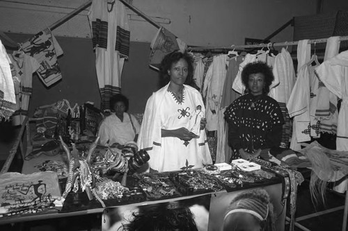 Women exhibiting items in their booth during the annual African festival, Los Angeles, 1986