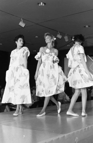 Women modeling spring fashions at California Mart, Los Angeles, 1985