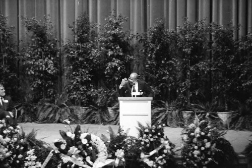 Man speaking at Sammy Davis Jr.'s funeral service, Los Angeles, 1990