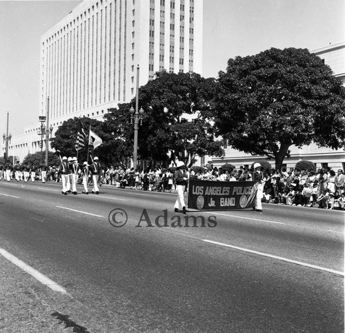 Los Angeles Police Jr. Band marching in a parade for Tom Bradley's inauguration, Los Angeles, 1973