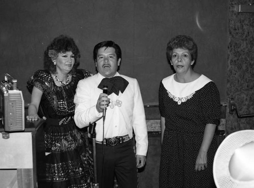 Mariachi singer performing during the Urban League Head Start State Preschool Awards Dinner, Los Angeles, 1985