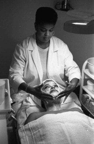 Staff at The Body Clinic apply a facial treatment, Los Angeles, 1986