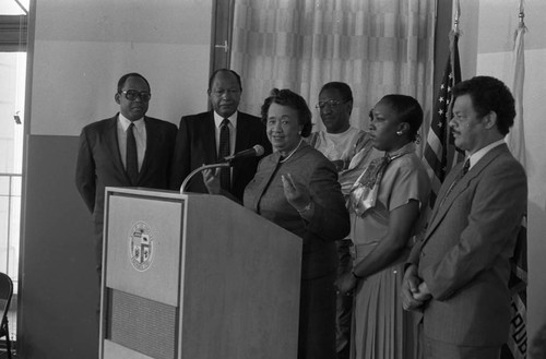 Black Family Reunion press conference participants listening to Dr. Height, Los Angeles, 1987