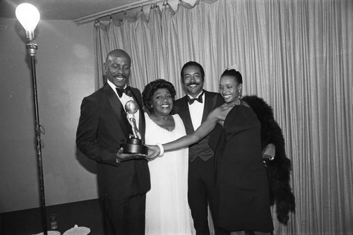 Louis Gossett Jr. posing with Isabel Sanford, Don Mitchell, and Beverly Todd at the NAACP Image Awards, Los Angeles, 1981