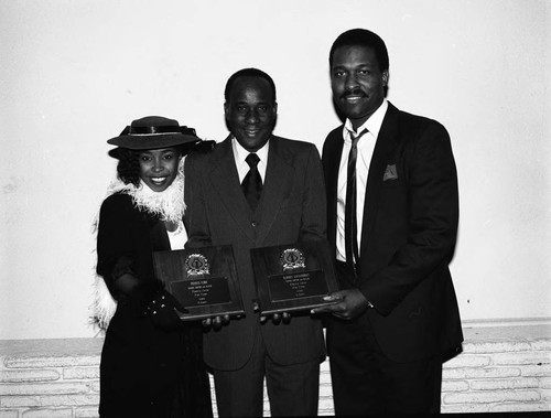 Penny Ford posing with Rodney Saulsberry and Bene Coleman at the Pied Piper Club, Los Angeles, 1984