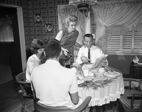 Hollingsworth having tea with family, Los Angeles, 1963