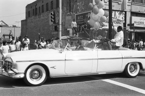 Tom Bradley riding in the South Central Easter parade, Los Angeles, 1986