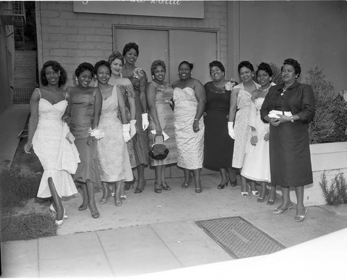 Hair stylists posing together during a fashion and hair show at Ciro's, Los Angeles, 1957