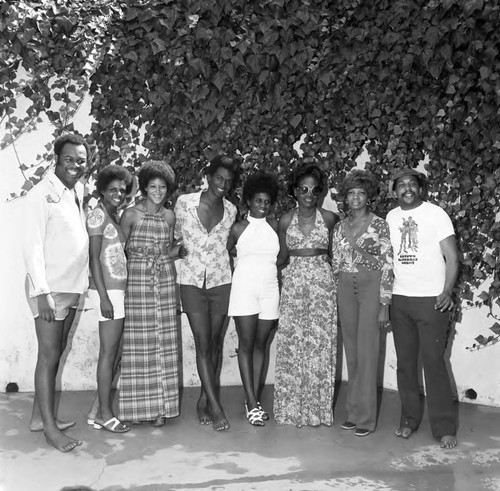 Greg Franks and Booker Griffin posing with others, Los Angeles, 1974