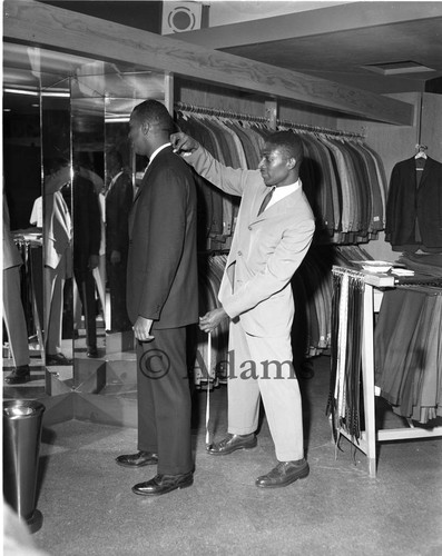 Suit fitting, Los Angeles, 1956