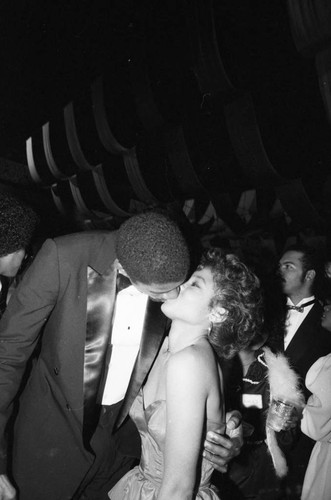 Magic Johnson kissing Janet Jackson at the American Music Awards, Los Angeles, 1983