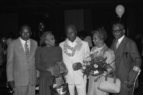 James Bohana posing with others at his 50th wedding anniversary celebration, Los Angeles, 1984