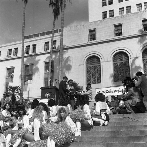 Tom Bradley and cheerleaders, Los Angeles, 1984