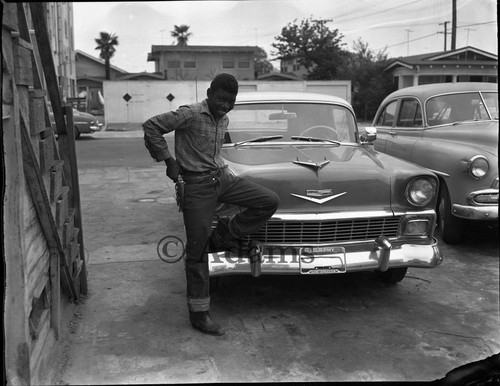 Young boy with gun holster, Los Angeles, 1954