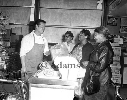 Shoppers in a grocery store, Los Angeles, 1964