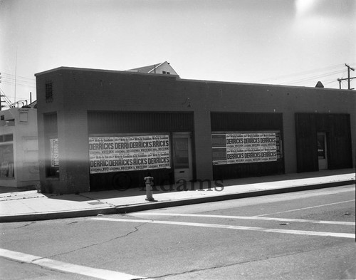 Derricks signs, Los Angeles, 1964