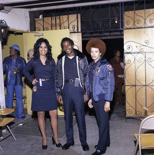 Security team members posing together at a Super Bowl party, Los Angeles, 1977