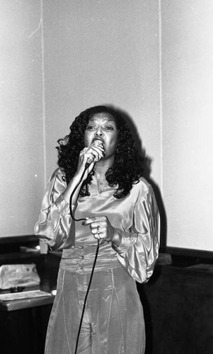 Association of Black Social Workers event participant performing, Los Angeles, 1982