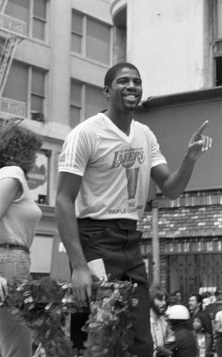 Magic Johnson riding a float in the Lakers Day Parade, Los Angeles, 1982