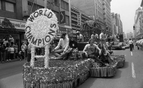 Kareem Abdul-Jabbar and Kurt Rambis riding on a float in the Lakers Day Parade, Los Angeles, 1982