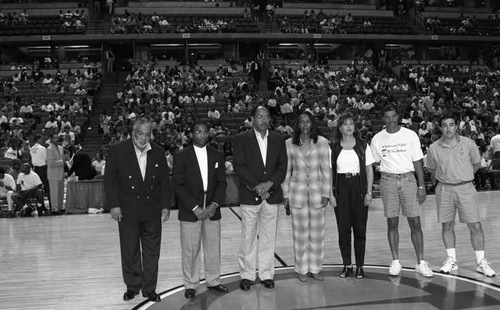 Participants of "A Midsummer Night's Magic" basketball tournament posing together, Anaheim, 1995