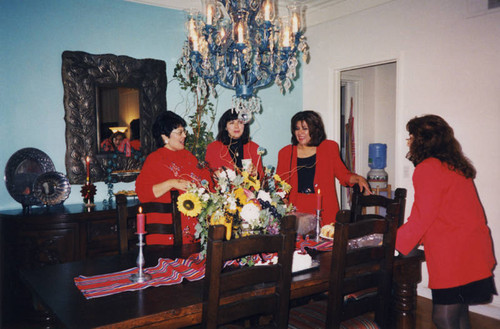 Comisión Femenil members celebrating Las Posadas