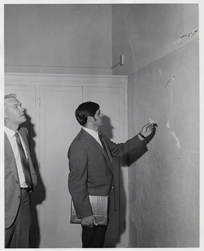 Julian Nava inspecting a school building