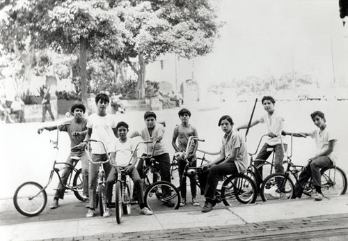 Young Latino boys with bicycles