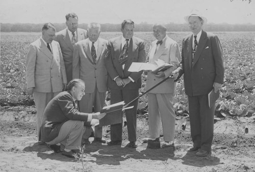 State officials check a proposed site for a public college in the San Fernando Valley