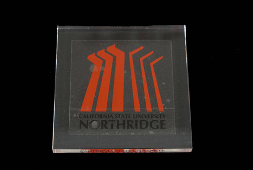 Sticker Under Plexiglass--California State University, Northridge logo, undated