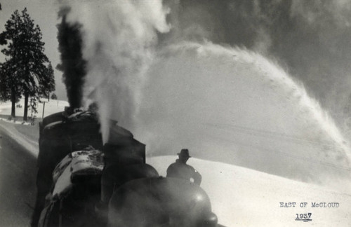 Steam Locamotive Plowing Through Snow