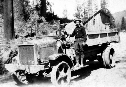 Jack Warner standing on truck