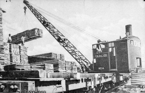 Crane Moving Lumber