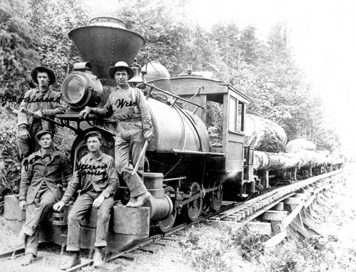 Men leaning on the front of a locomotive