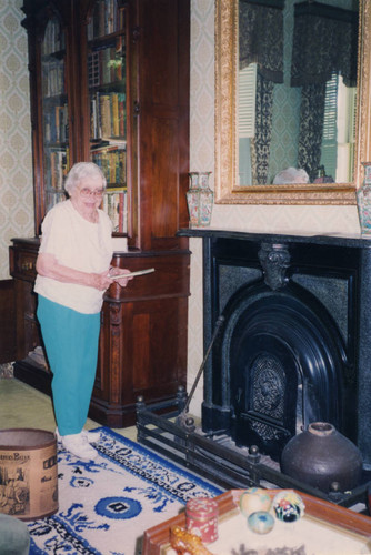 Hester Patrick in Front of Fireplace