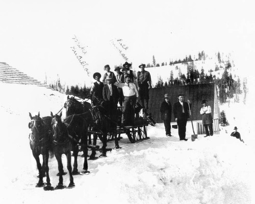 Group of men on sleigh--Soper-Wheeler Company