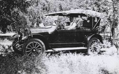 Dorothy Camper and her father in a Nash automobile