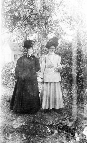 Ladies standing in a yard