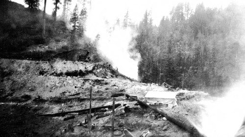 Early stages of excavation of the diversion dam site on Bucks Creek Hydroelectric Project