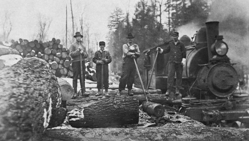 Wheeler and Dusenbury workers near rail line