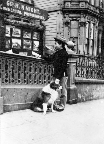 Young Man Standing in Front of George H. Knight's Photography Studio