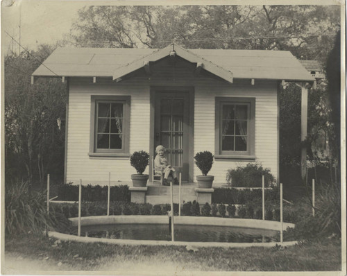 House with child on porch