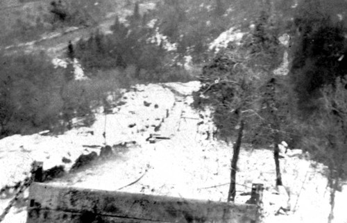 View down the side of a canyon during construction